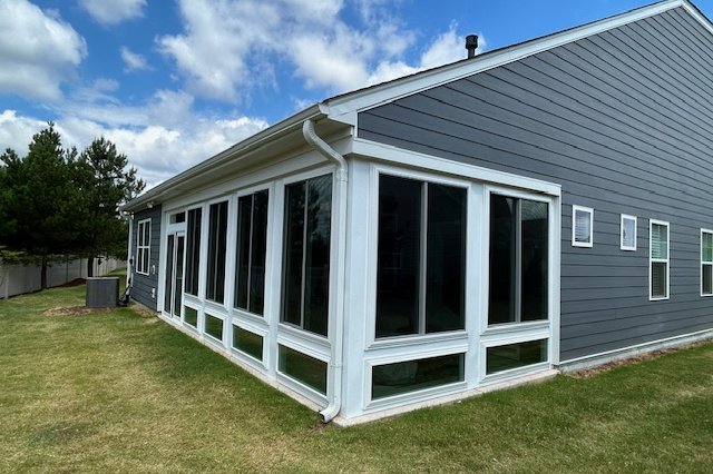 Side wall of a home with gray lap siding