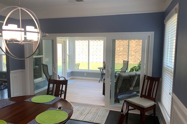 Bright room lined with windows