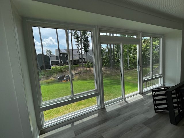 Interior view of sliding windows above picture windows