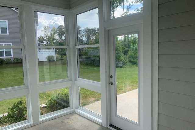 Interior view of new windows and a glass door